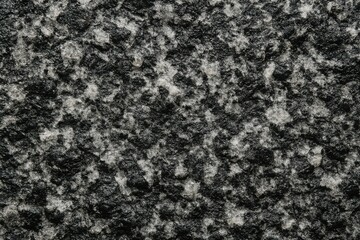 Monochrome granite slab background with rugged grains for architecture design use