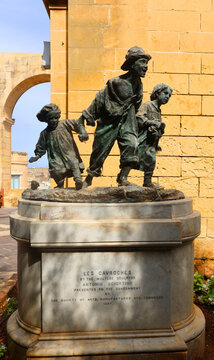 VALLETTA MALTA: Les Gavroches is a bronze sculpture by Antonio Sciortino, depicting Parisian street children inspired by Gavroche from the 1862 Victor Hugo novel Les Miserables.