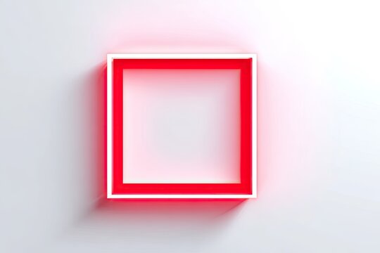A glowing red square, emitting soft light, floats against a white, slightly blurred background
