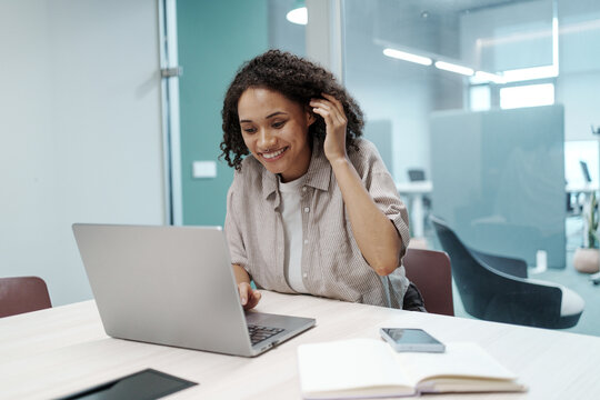 Lady Managing Client Inquiries Calmly. Female Specialist Addressing Customer Concerns With Composure