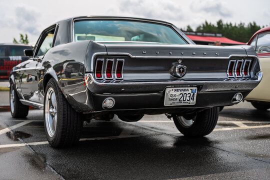 LINTHE, GERMANY - JUNE 08, 2025: Iconic sports car Ford Mustang Fastback, 1967. Rear view. Die oldtimer show.