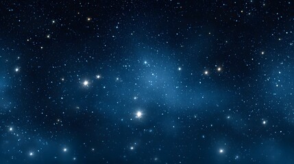 Obraz premium Starlit Celestial Canvas: Witness the awe-inspiring beauty of the cosmos, where countless stars glimmer against a deep indigo expanse, offering a serene and captivating celestial view.