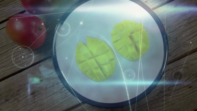Camera pulling back revealing plate with two scored yellow halves, lights orbiting showing layout