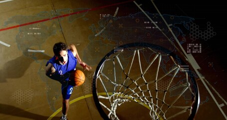 Leaping athlete in blue  2 jersey holding orange ball toward hoop on court with digital overlays © vectorfusionart