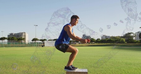 Naklejka premium Squatting athlete wearing blue tank top, black shorts on wooden plyo box at sports field, wireframe