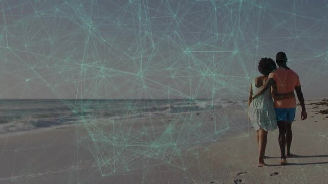 Couple starting right walking arm-in-arm sharing love along beach leaving prints tech mesh shifting