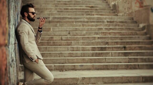 Businessman Recording Voice Message On Smartphone.  Entrepreneur Using Mobile Phone For Business Communication 