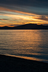 Fototapeta premium Salish Sea Sunset English Bay Vancouver.Colorful sunset on English Bay at Jericho Beach. Vancouver, British Columbia. 