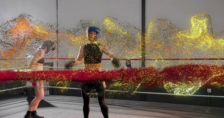 Sparring boxer in black tank with black gloves and blue headgear inside gym ring, gold particles