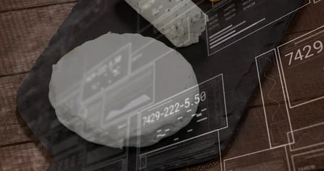 Fotobehang Zuivelwaren Showcasing white cheese wheel on dark slate board, wooden table, with herb goat log and HUD  © vectorfusionart