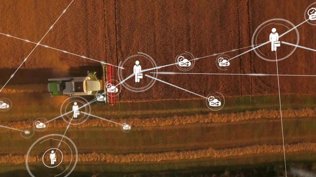 On appearing, combine cutting crop, person icons spreading and linking across field for smart farm