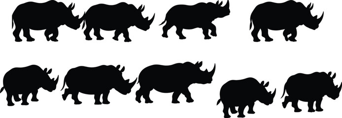 Powerful rhino silhouettes collection, wild rhinoceros vector icons set, walking and standing African wildlife shapes on a white backgroun © Robbani