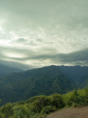 Fototapeta premium The view of the mountains in the morning with bright but slightly foggy weather feels a little cold and looks scary