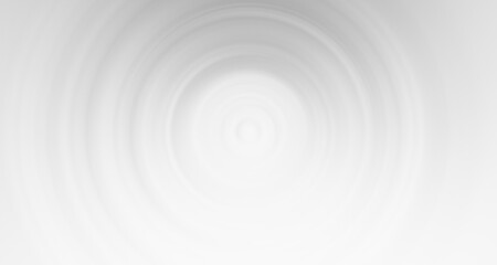 Minimalistyczne białe tło z delikatnym efektem koncentrycznych fal i subtelnym gradientem. © markstudio2008