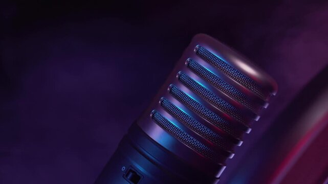 Studio Microphone Coming into Focus with Neon Lights