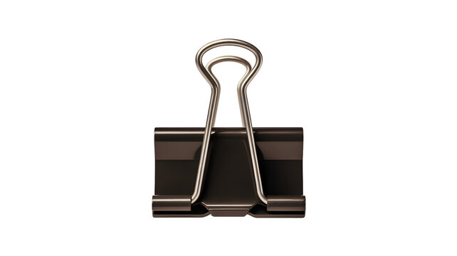 A close up view of a metal binder clip on a black background