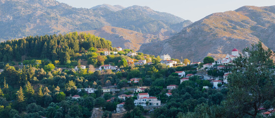 Obraz premium Mountain village Lakkoi in western Crete surrounded by pine forest on sunny day