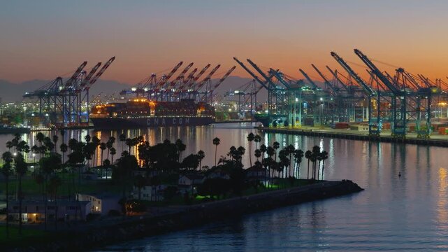 LA, CA, USA - Feb 27, 2026: Port of Los Angeles Container Terminal at Dusk with Gantry Cranes