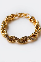 Obraz premium Elegant gold bracelet on a pure white background