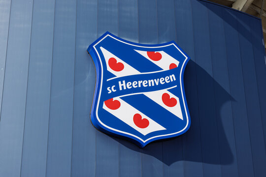 Close-up of the sc Heerenveen football club crest on a blue wall. Featuring the iconic Frisian flag colors and red pompebl&ecirc;den leaves. Heerenveen, Netherlands, 26 february 2026