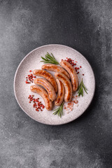 Grilled pork or chicken sausages, smoked fried food with salt and spices. Grilled sausages