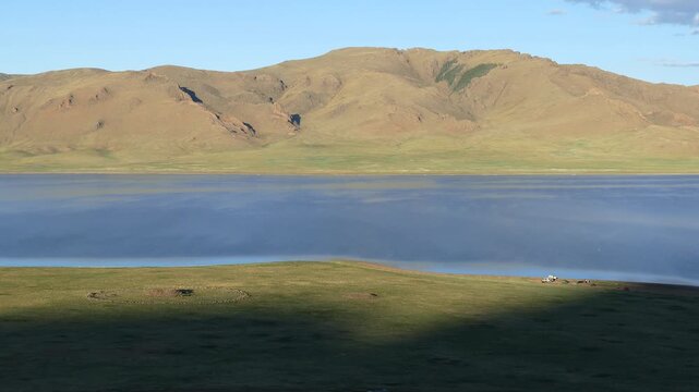  Tourist camp and Kheregsuur (ancient burial mound) on the shore of the lake.