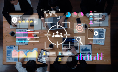 A dynamic business team engages in strategic planning using digital tools, exploring data...