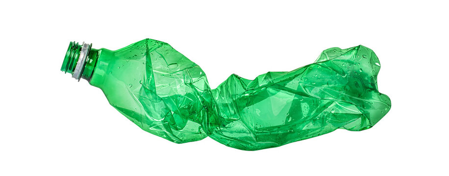 Crushed green plastic bottle for recycling isolated, environmental waste reduction concept