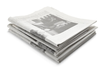 Stack of folded newspapers isolated on white