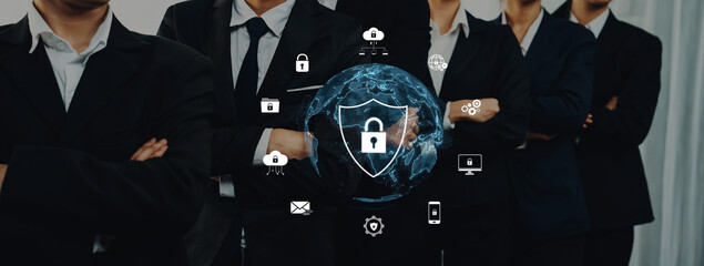 A group of professionals in suits stands confidently, displaying a visual representation of cybersecurity concepts with a globe, icons, and digital protection elements. Trope © InfiniteFlow