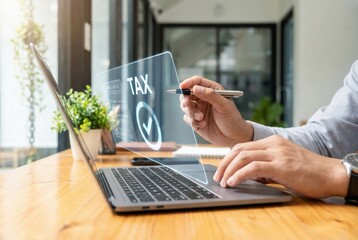 Woman reviewing digital tax document with pen and laptop in modern office
