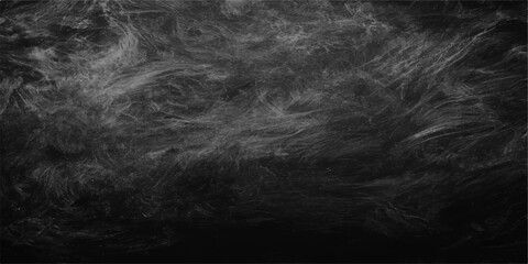 Abstract black and white background with white spots resembling a dark cloudy storm sky with smoke texture and night fog