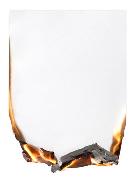 White sheet of paper with burning and burnt edges isolated background on white