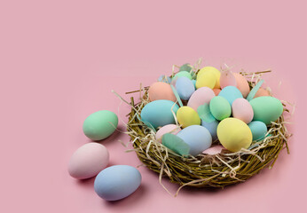 Fototapeta premium easter eggs in a nest passover