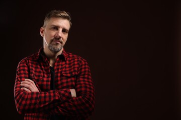 Obraz premium Man with beard on dark background. Space for text