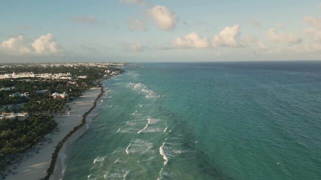 Aerial View of Tropical Coastline with Beach, Ocean, and Resorts in Playa del Carmen Mexico
