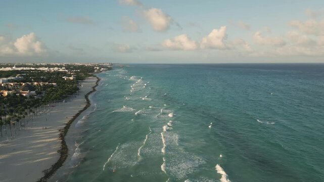 Aerial View of Tropical Coastline with Beach, Ocean, and Resorts in Playa del Carmen Mexico