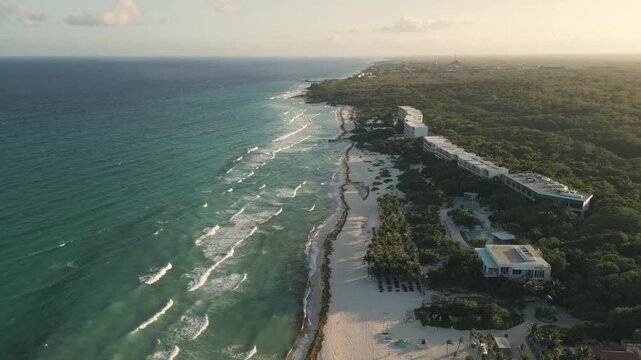 Aerial View of Tropical Coastline with Beach, Ocean, and Resorts in Playa del Carmen Mexico
