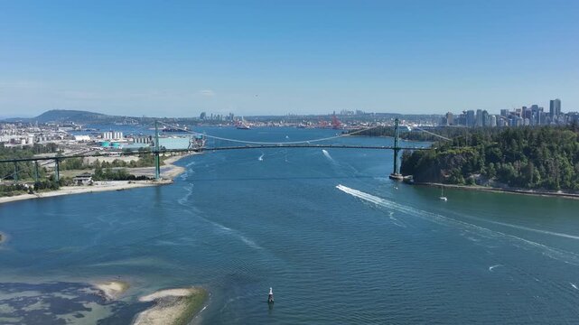 Aerial View of Lions Gate Bridge and Downtown Vancouver Skyline Over Burrard Inlet, British Columbia Canada