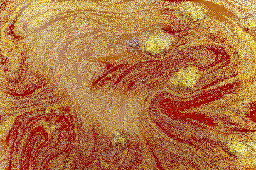 Texture astratta con polvere di glitter in soluzione con acqua e solvente