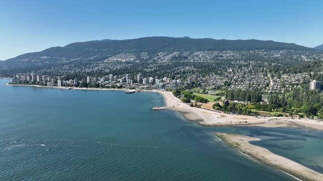 Aerial View of Ambleside Beach and West Vancouver Coastline with North Shore Mountains, British Columbia Canada