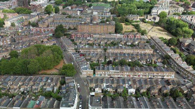 Aerial view of Victorian terraced homes in Stoke Newington, Hackney, adjacent to Clissold Park, showcasing classic London residential life.