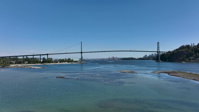 Drone Flying Above Burrard Inlet Toward Lions Gate Bridge, Vancouver British Columbia Canada