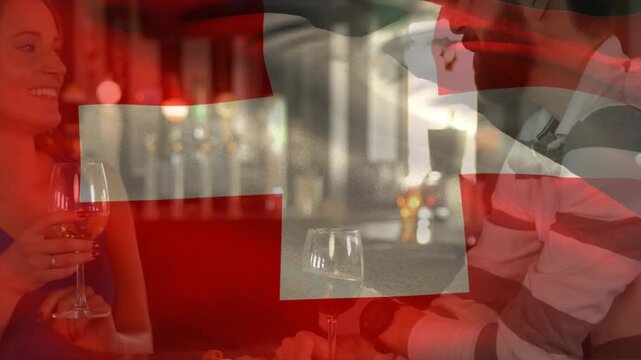 Couple touching wrists, conversing at bar as flag overlay obscuring faces for dating, hospitality