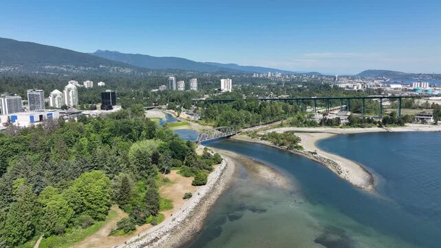 Drone Flying Toward Burrard Inlet and Ironworkers Memorial Bridge, Vancouver British Columbia Canada