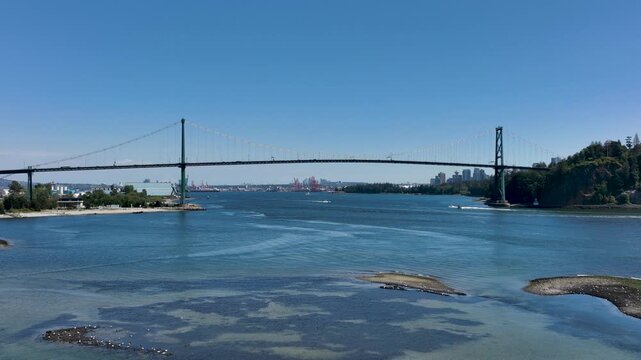 Drone Flying Toward Lions Gate Bridge Over Burrard Inlet, Vancouver British Columbia Canada