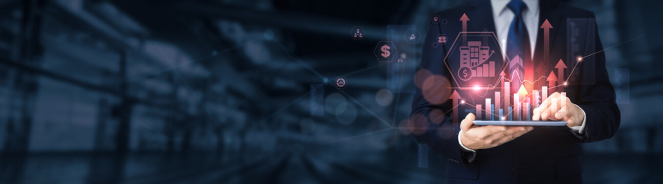 Businessman using a tablet for analyzing corporate finance data and information, financial planning, budgeting, investment analysis, risk management, accounting strategy.