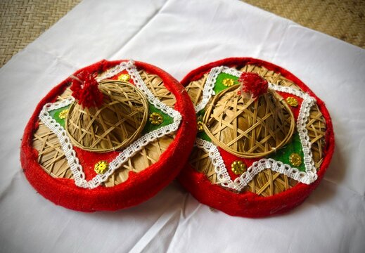 JAPI is a traditional, conical sunshade hat from Assam, handwoven from bamboo, cane, and tokou leaves.Japi is a major cultural symbol of Assam.