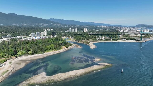Orbital Aerial View of Burrard Inlet Sandbars and Lions Gate Bridge Near Vancouver, British Columbia Canada