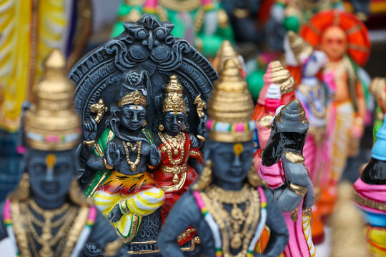Shiva and Parvathi idols displayed for sale in a shop for the golu festival